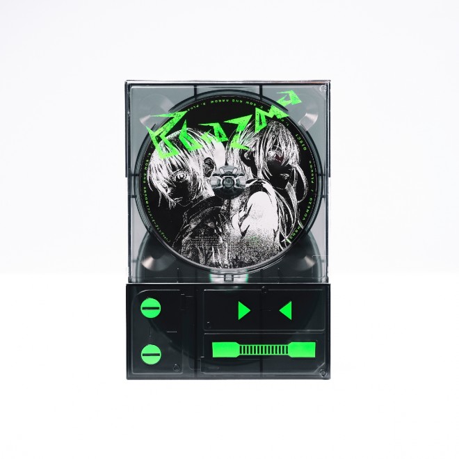 Kenshi Yonezu celebrates his 15th single “Plazma / BOW AND ARROW” with four editions, including controller device and HALO versions, illustrated by Yonezu himself. Poster campaigns and a live photo exhibition shot by Jiro Konami further mark this release.